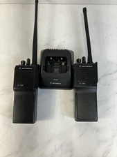 Lot of 2 Motorola HT1000 Two-Way Radios and One Charger. See Description