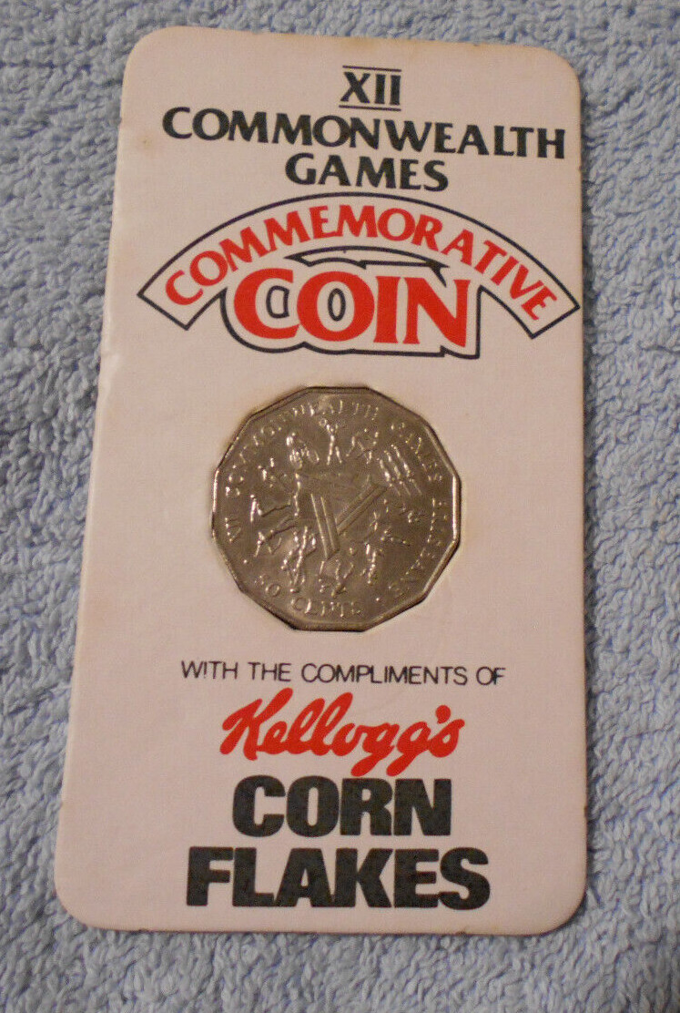 #D341. 1982 KELLOGGS CORN FLAKES BREAKFAST FOOD PROMO WITH 50 CENT COIN ...