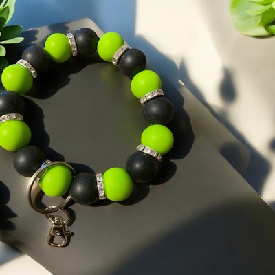 Handmade lime green and. Black  Stretchy Wristlet Key Chain With Silver Key Ring
