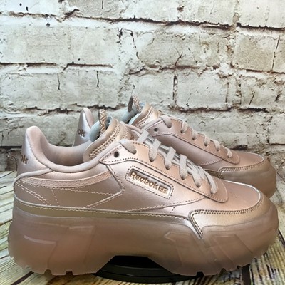 cardi b gold sneakers