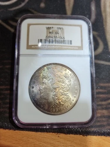 1887  *P* MORGAN SILVER  $1 DOLLAR  NGC MS64 WITH NICE TONING.