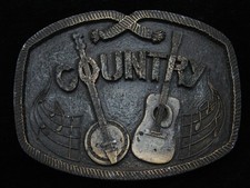 RA09107 VINTAGE 1976  COUNTRY MUSIC  COMMEMORATIVE BRASSTONE BELT BUCKLE