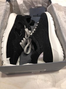 black and silver designer sneakers
