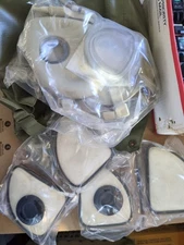 MILITARY GAS MASK MLT 9140 W/4 FILTERS SEALED AND NEW MASK & Storage Bag