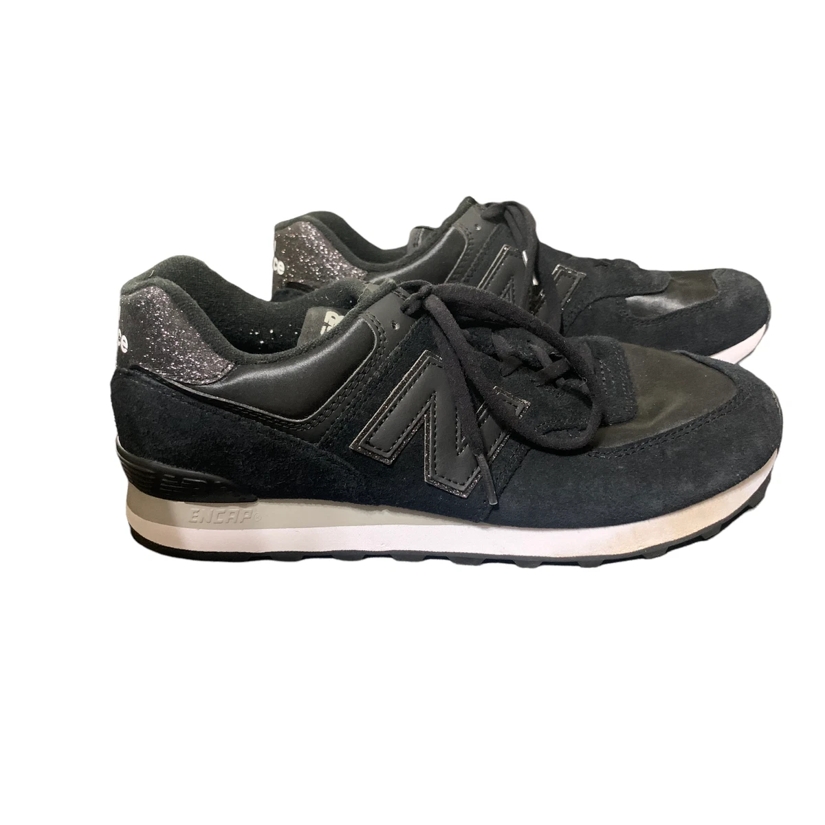 New Balance women s 574 black glitter sneakers size 11