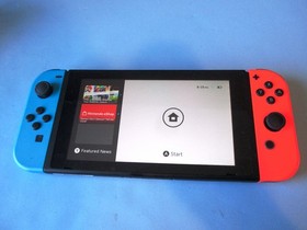 Nintendo Switch System Console w/Neon Red & Blue Joy-Cons + Dock & Extras