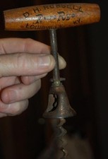 Rare 1890's D.H. RUSSELL PURE RYE LOUISVILLE KY.ADVERTISING CORKSCREW OPENER