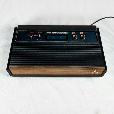 Atari 2600 Woody Console + Vid-Lid Plus + RadioShack Switcher + Controllers