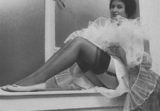 Mature Lady In Black Nylon Stockings And Frilly Skirt Pose - Photograph 34