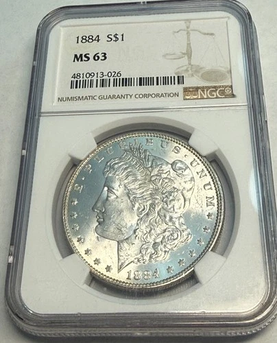 1884 satiny white choice BU Morgan silver dollar. NGC MS63. #kk026