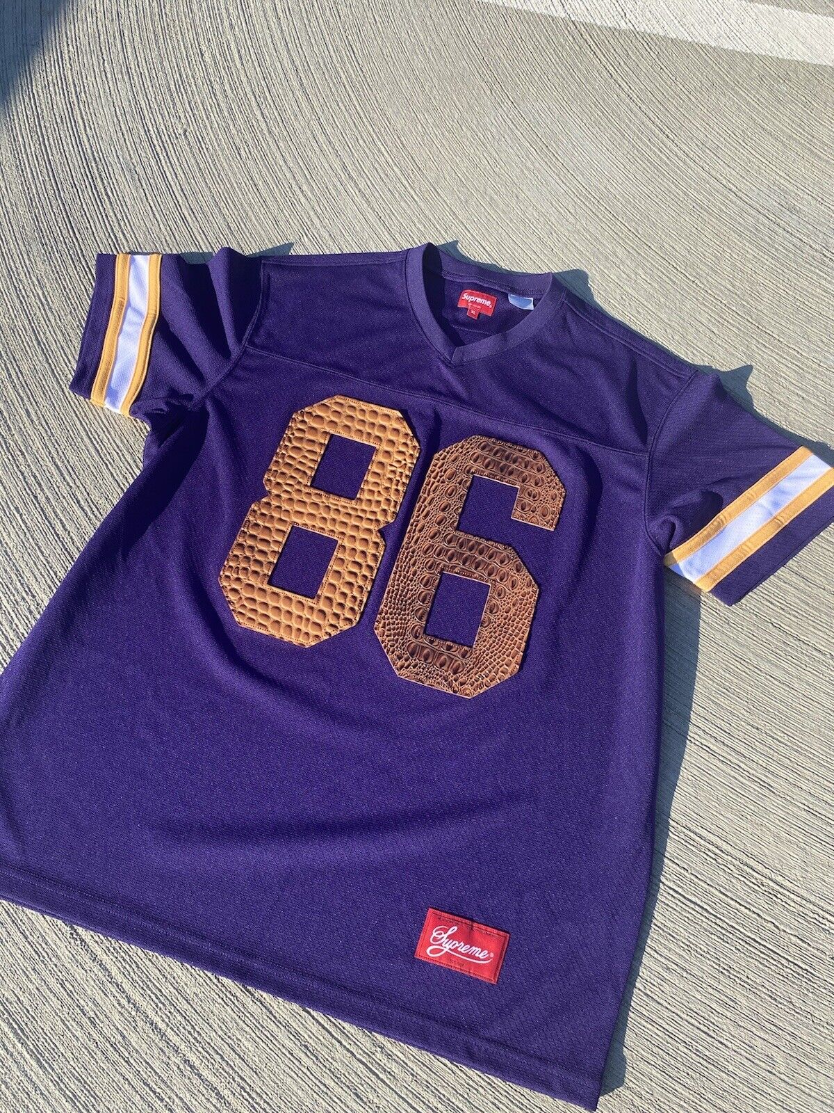 purple and gold jersey