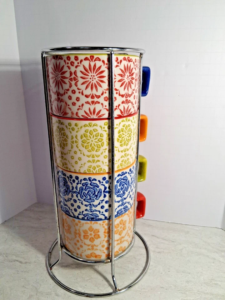 Pier One Inports Juego de 4 tazas apilables de gres pintadas a mano con soporte. Foto 3 de 4