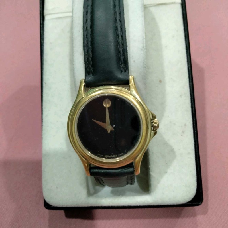Watch SWISS MADE QUARTZ MOVADO MUSEUM CLASSIC 87-E4-0823 blk dial goldtone case.