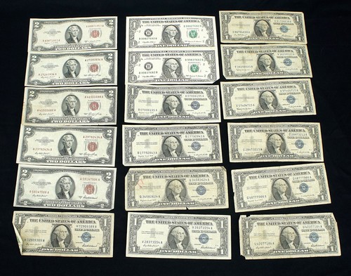 Lot of 1 Dollar Silver Notes, 2 Dollar Red Seal bills, And An Uncut Dollar bill