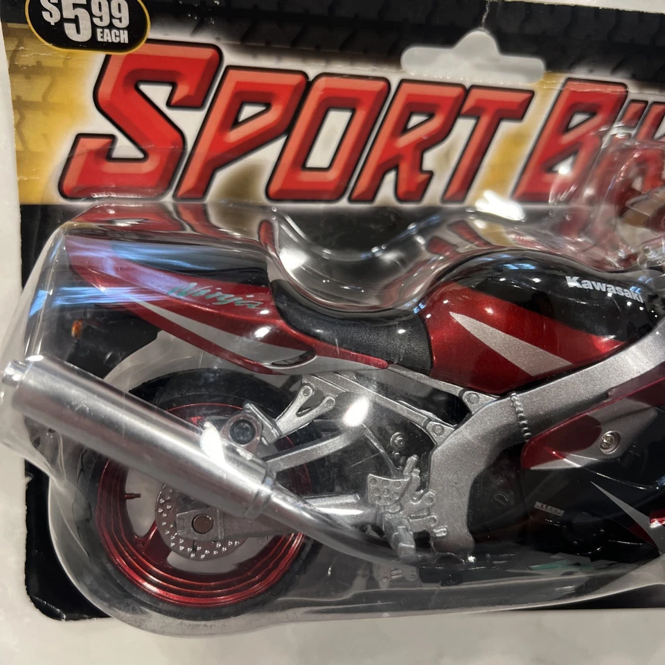 KAWASAKI ZX-9R ESCALA 1:12 ROJO/NEGRO POR NEW RAY FUNDIDO A PRESIÓN CON PIEZAS DE PLÁSTICO Foto 2 de 4