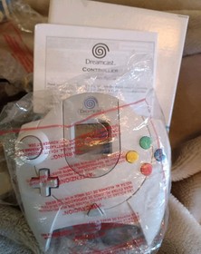 Opened Unused Dreamcast Console Bundle with Sealed Games and Discs Boxed
