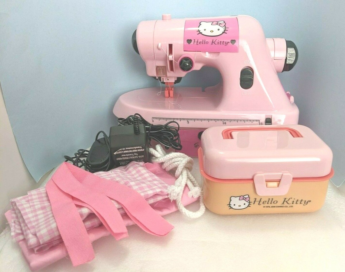 AH. Sanrio Hello Kitty 2 in 1 Fashion Center Sewing Machine AH. Sanrio Hello Kitty 2 in 1 Fashion Center Sewing Machine