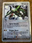 Rayquaza ex 97/97 Dragon Holo  is raw