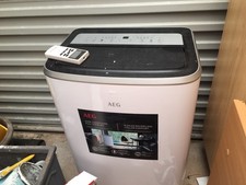 AEG axp26u338cw portable air conditioning unit. In perfect condition. 12000 btu