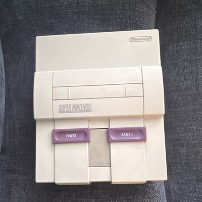 Used SNES With 2 Games 1 Controller Power Cord And T.V. Output