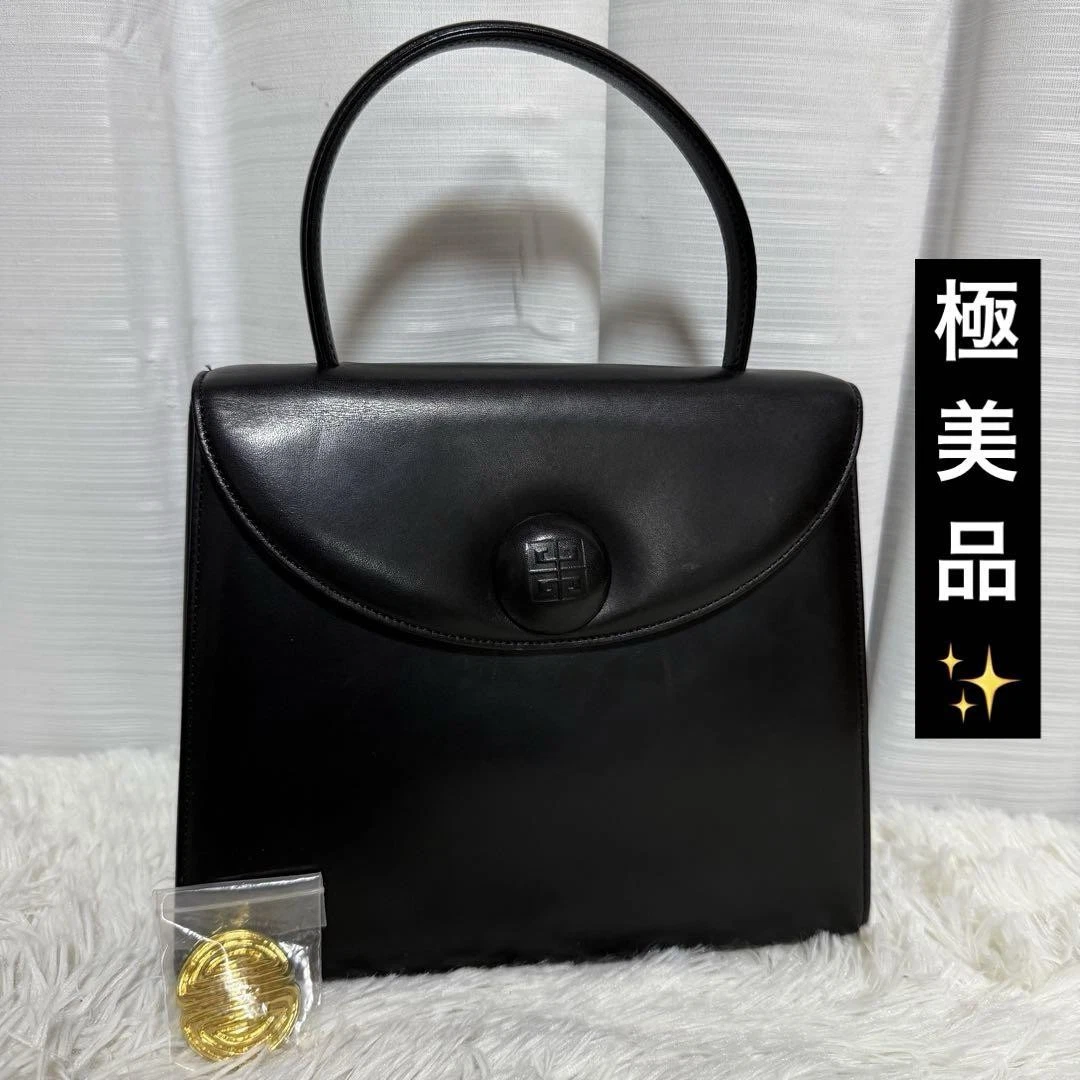 Borsa a mano Givenchy in ottime condizioni borsa formale nera con bottoni di ricambio