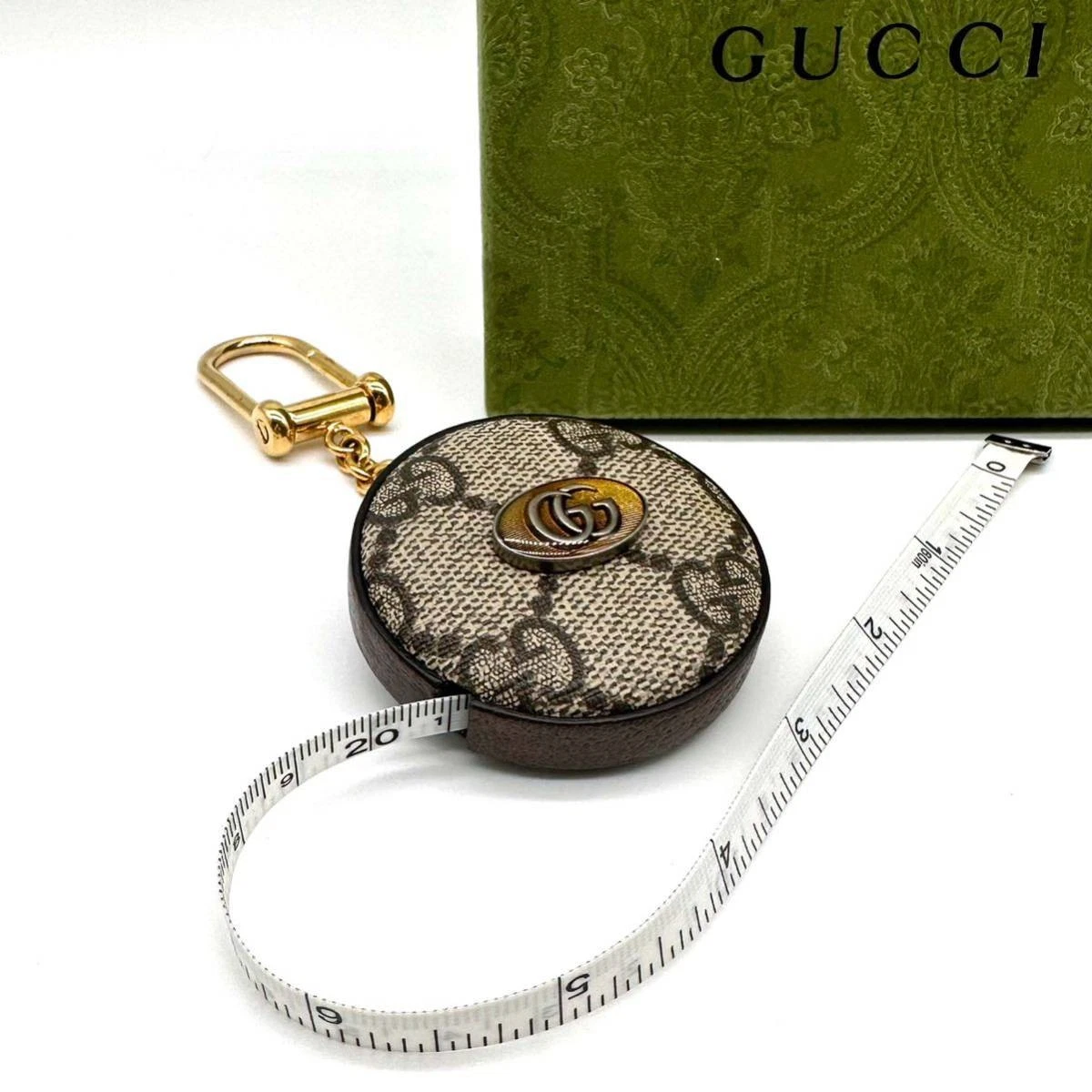 Gucci GG Supreme Porte clés Ruban Mesure 150cm Occasion Grade AB Design Notable