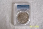 1884 - O  morgan silver dollar 90 % silver PCGS - MS64