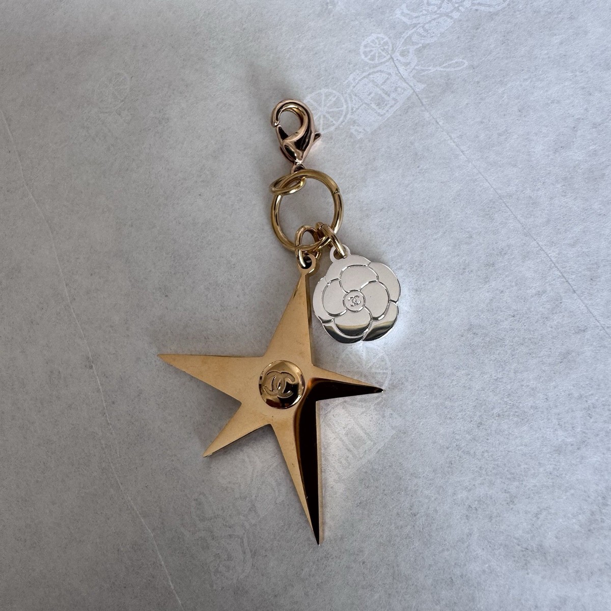 NEW Chanel 2025 Christmas Gold Charms Camellia Star Keychain Black