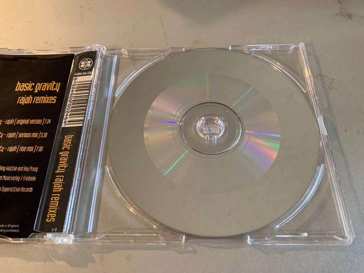 Basic Gravity CD Rajah (Remixes) VG-Disc is VG with some light