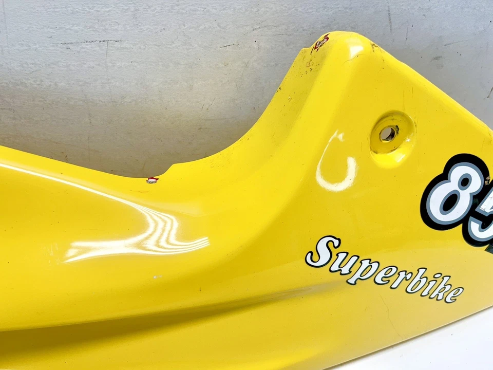 Panel de carenado trasero izquierdo genuino Ducati 851 Strada 48230061A grietas amarillas Foto 3 de 4