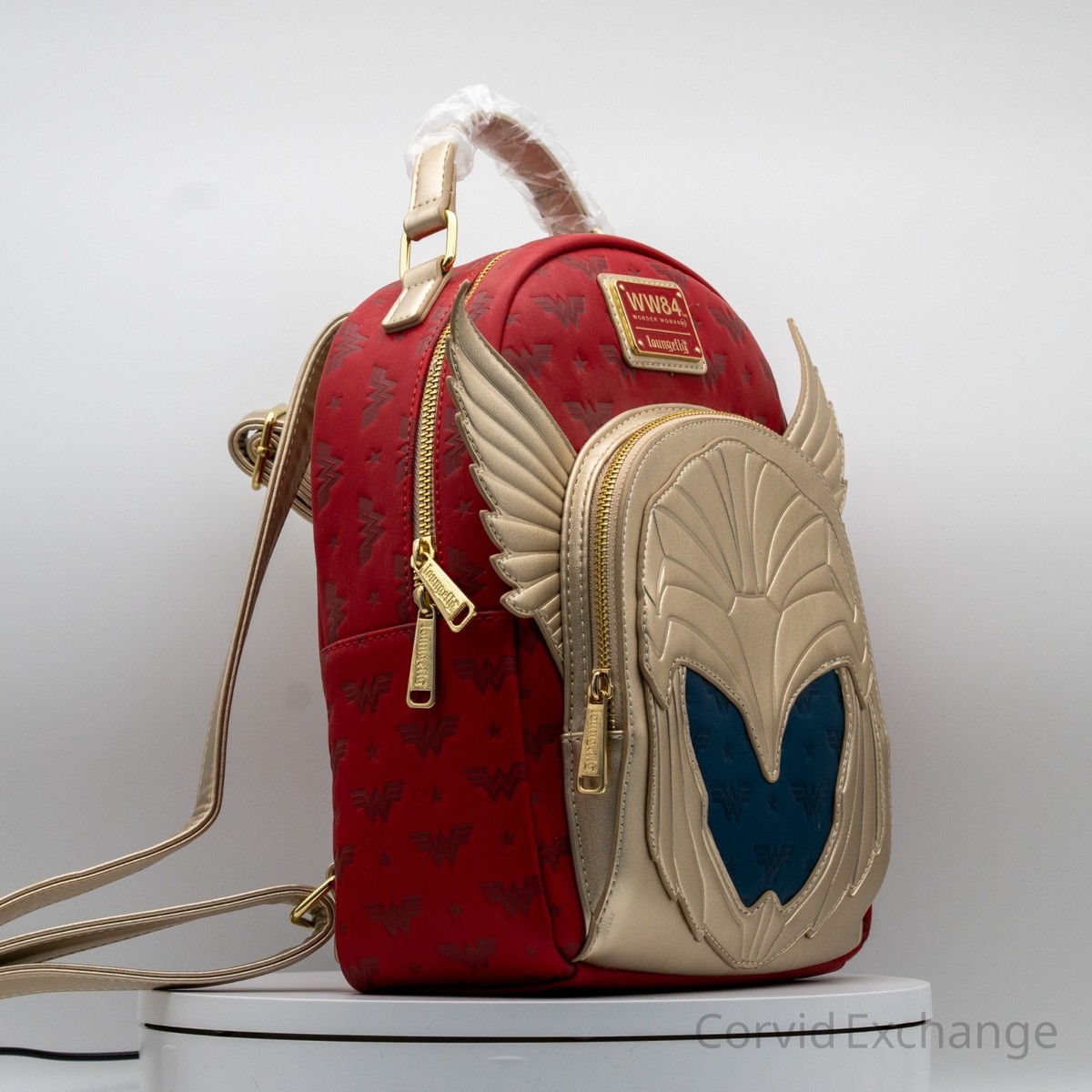 Loungefly DC Comics Wonder Woman 1984 Metallic‎ Gold Mini Backpack Wonder Woman Gold Mini Backpack — MEL | Dallas Lifestyle +  main image 4