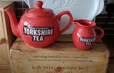 yorkshire teapot and milk jug orange red colour 