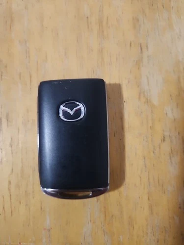 Mazda OEM smart key FCC ID WAZSKE11D01 3 button - product listing photo