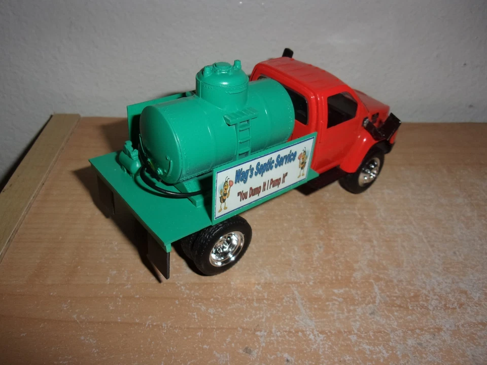 New Ray Chevy Kodiak C4500 Custom Septic Tank Pumper Truck Orange 1:43 - Image 2 of 4