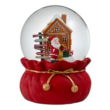 Santa Checking His List Christmas Snow Globe by The San Francisco Music Box