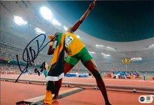 USAIN BOLT SIGNED 12x8 9.58 OLYMPICS LEGEND JAMAICA PHOTO (ACG CERT AG16770)