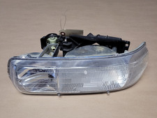 OEM Left Headlight Assembly 1998-2006 Chevy Silverado GMC Sierra 1500-3500