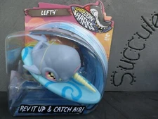 MGA Shreddin Sharks. Lefty! Rev it up & catch air Fun NIP Action Figure
