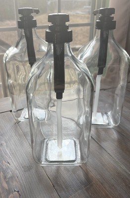 Target Bullseye Large Glass Dispenser Set of 3 Laundry Coffee Syrups Pumps NEW