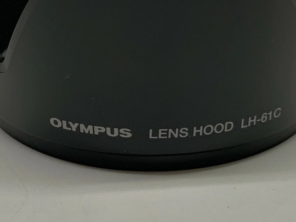 Parasol Olympus LH-61C genuino OEM para lente digital Zuiko Foto 2 de 4
