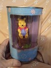 Winnie the Pooh 4" figurine w/ honey pot on tree stump in metal round tin Disney — photo 8