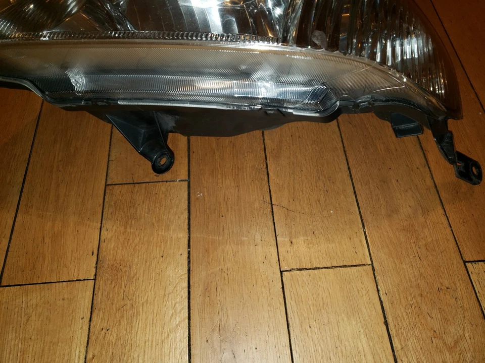 Faro halógeno izquierdo fabricante de equipos originales Mercury Mariner 2005 2006 2007 Foto 2 de 3