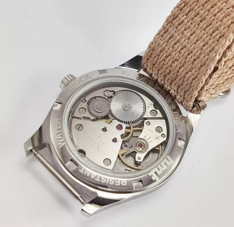 Reloj Pulsera HMT Piloto Esfera Perla 17 Joyas Cuerda Manual Esqueleto Trasero Funcionando Foto 3 de 4