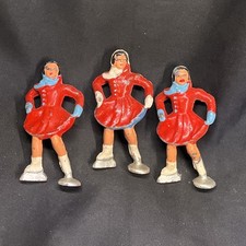 Three Red Skaters at Christmas Toy Figures by Barclay 2.5  
