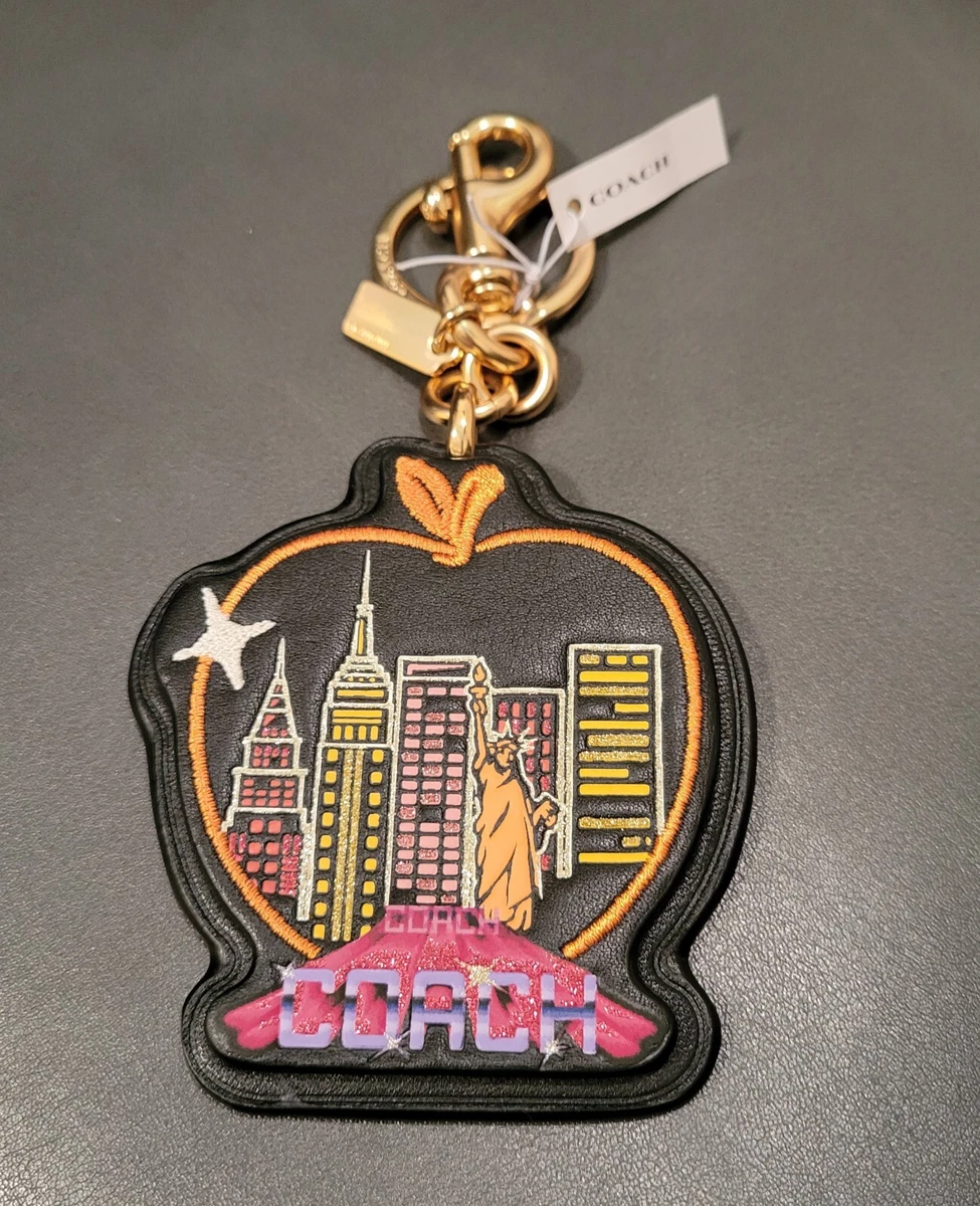Coach apple online bag charm