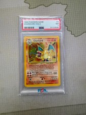 1999 POKEMON SET BASE ILLIMITATO #4 CHARIZARD-HOLO PSA 7