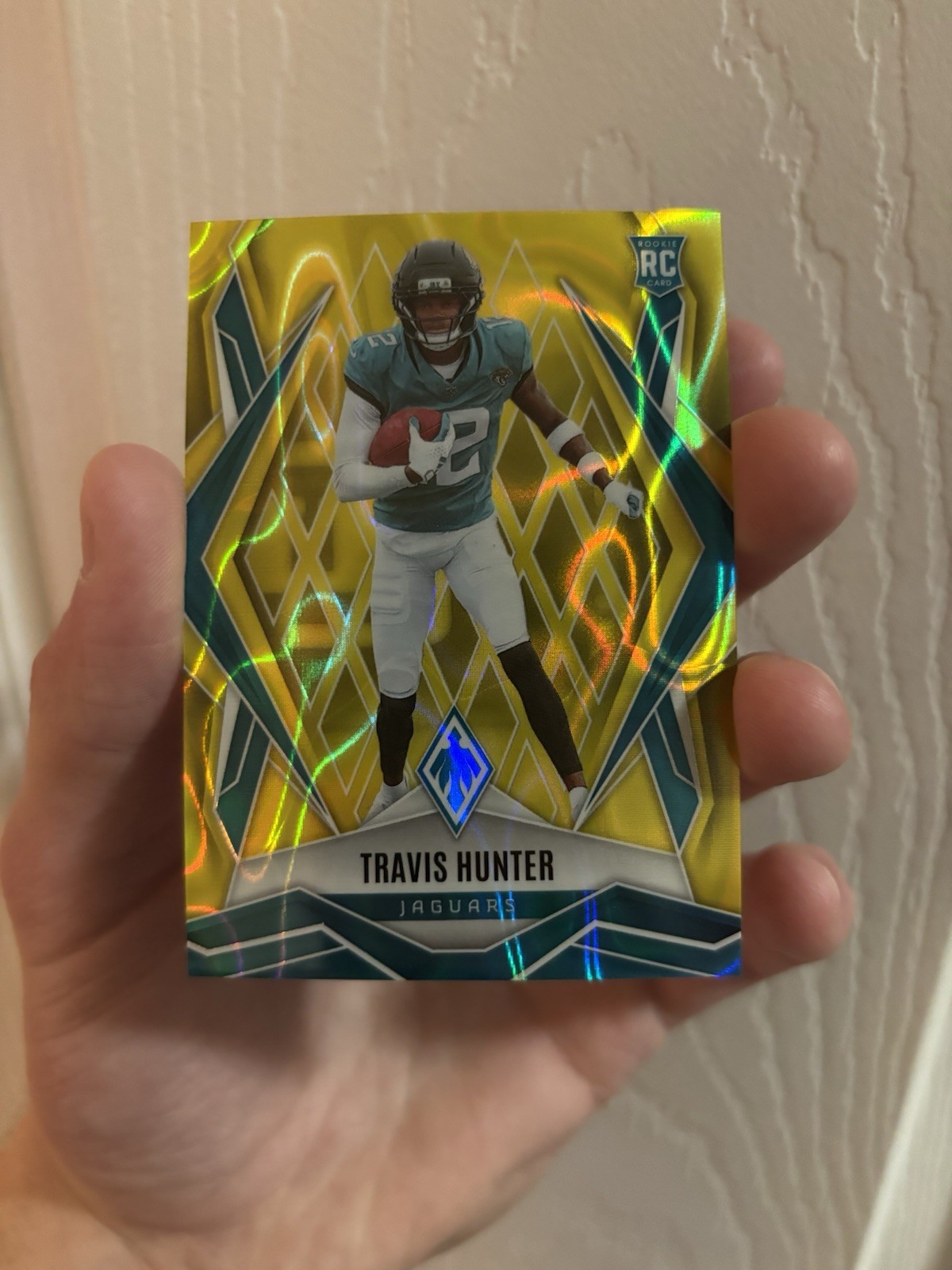 Panini Phoenix 2025 Travis Hunter Jaguars Rookie Yellow Lava #157/125