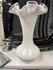 Fenton Silver Crest milk glass vase with a ruffled clear rim.