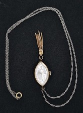 Endura Gold Tone Pendant Watch Vtg Pendant Clear Back Swiss Mechanical 1 Jewel