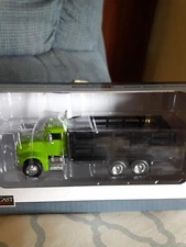 NIB 1/64 Lime Green Pete 385 Stakebed SpecCast